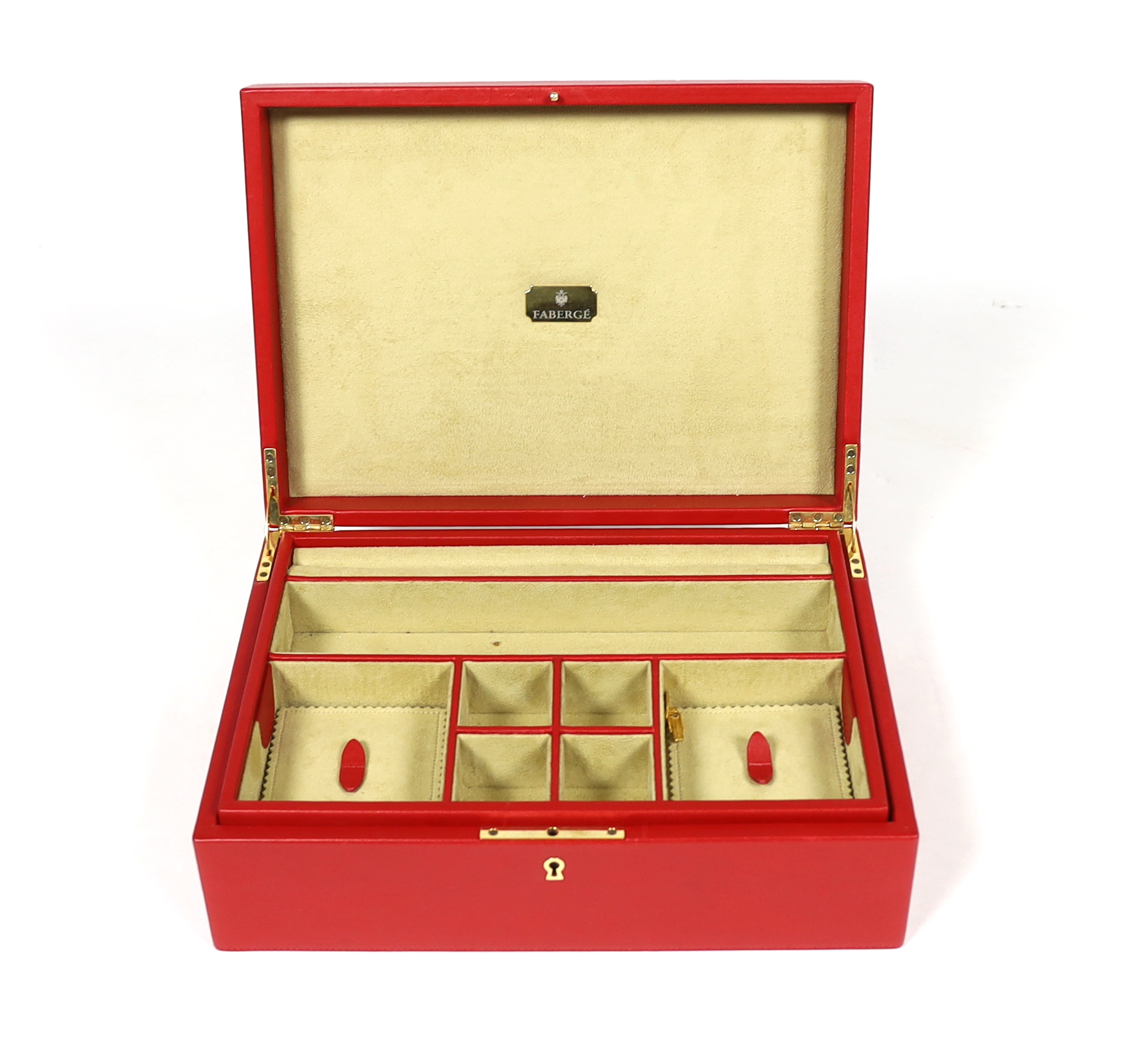 A Fabergé cased red leather jewellery box, width 33cm